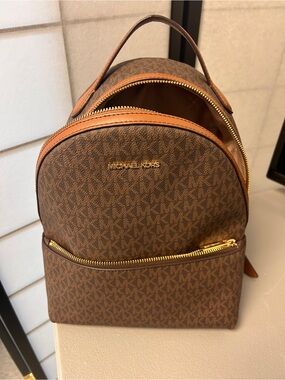 Michael Kors Brown MK Signature Mini Backpack with Gold Hardware